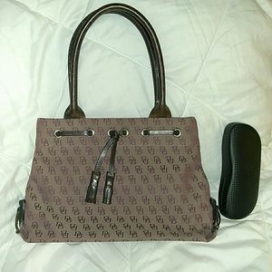 Dooney and Burke small maroonish colored purse